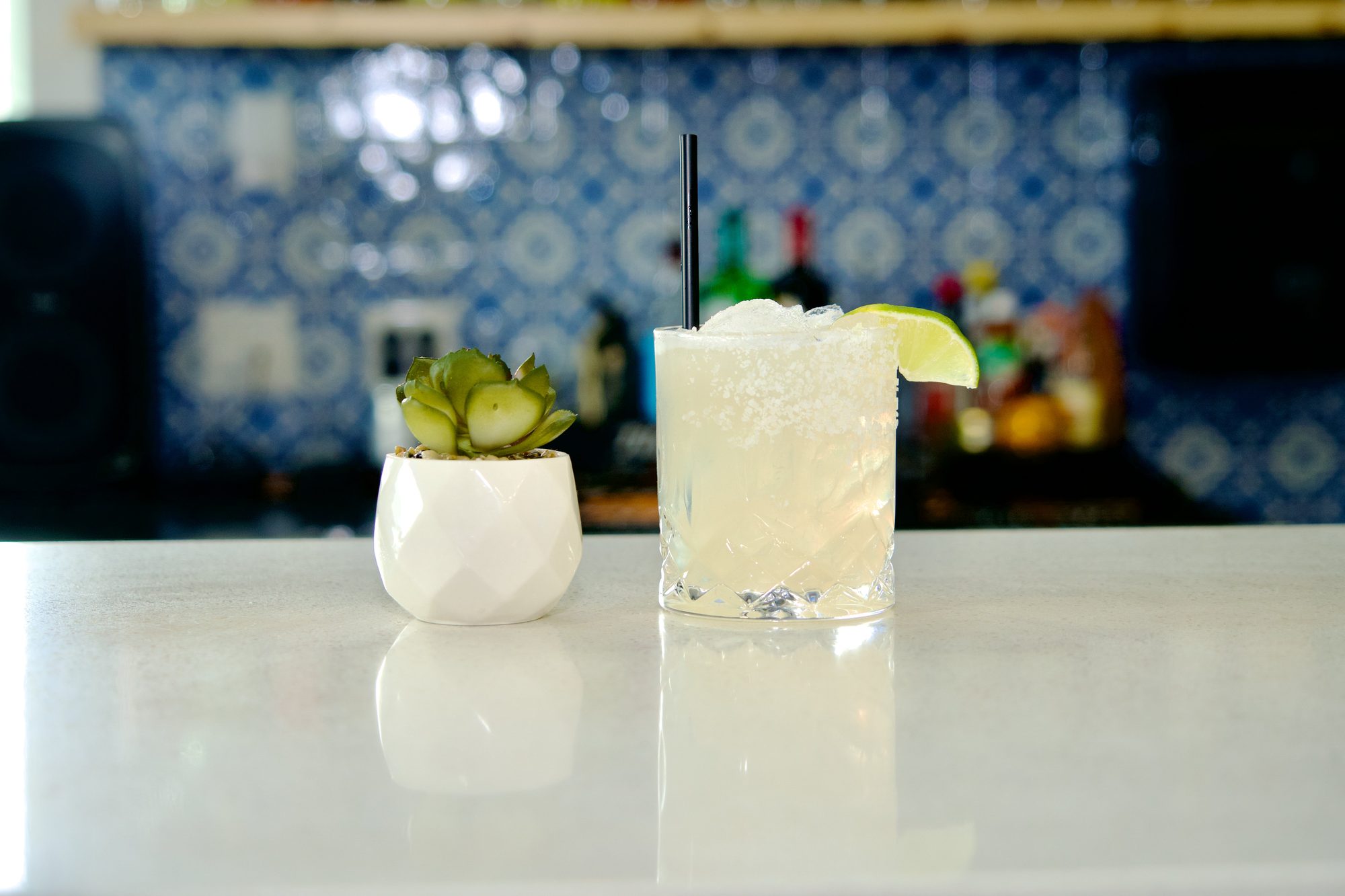 A margarita on the Courtside Cantina bar against blue patterned tile